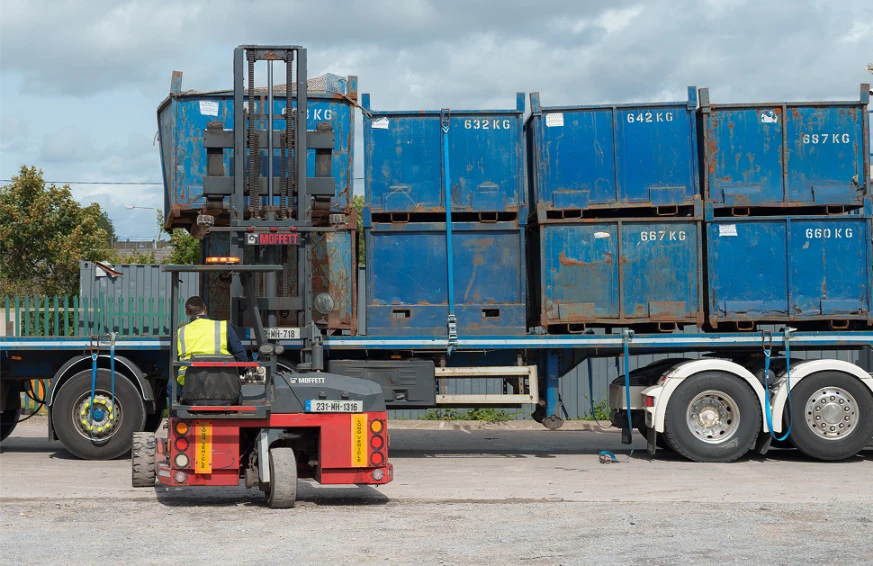 forklift loading trainer with scrap metal bins