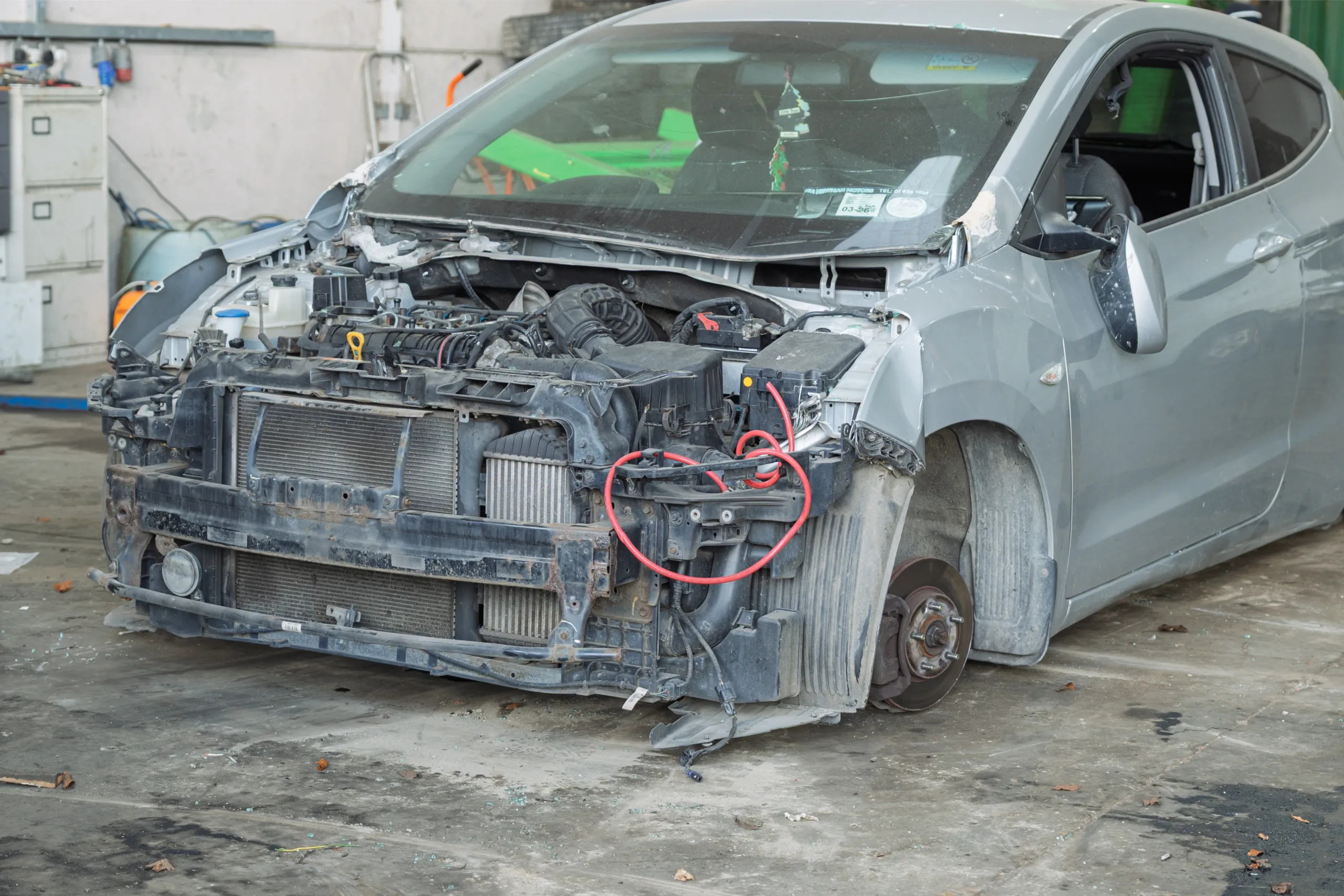 scrap car with front bumper removed