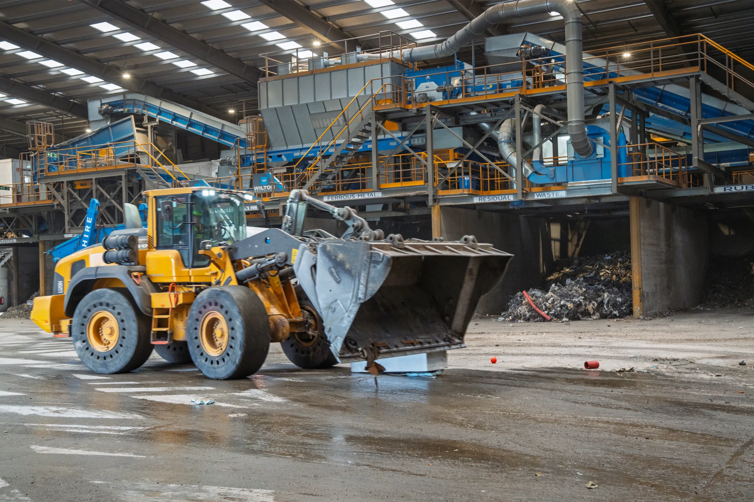 srf facility inside yellow volvo